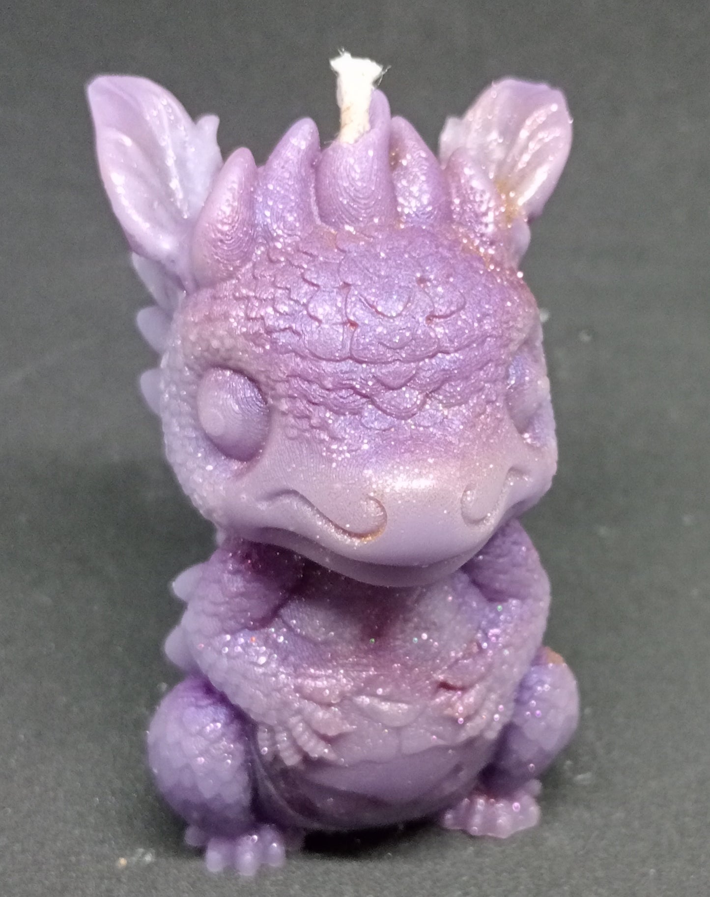 Baby dragon candle
