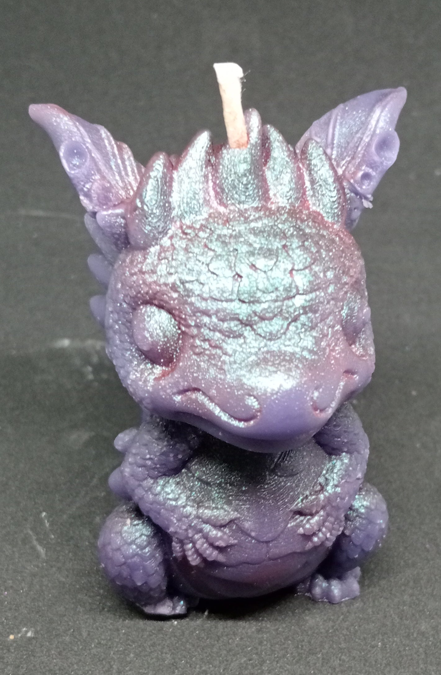 Baby dragon candle