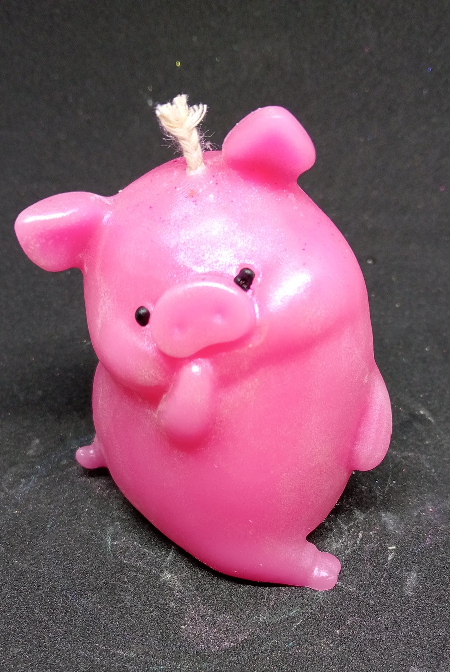 Bashful piggy candle